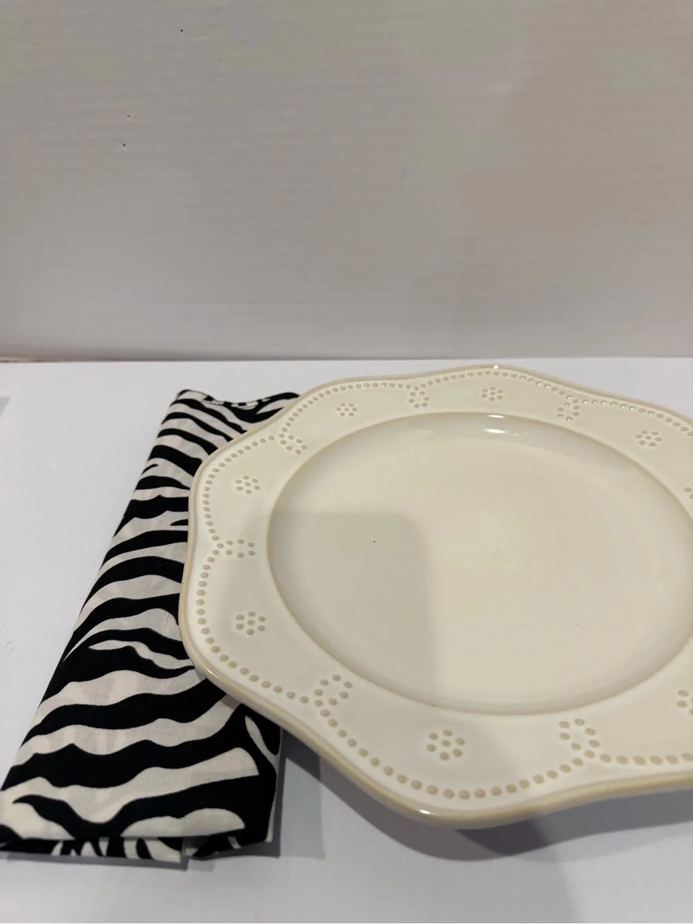 Set of 13 cotton 20x20” Zebra Print Napkins, Black & White, used for a party.